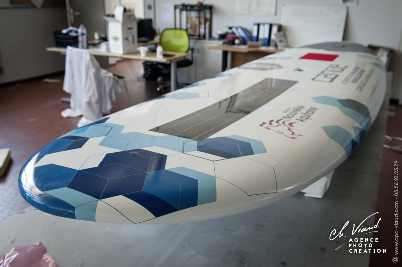 Création, impression et pose d'un stickers covering pour planche de paddle