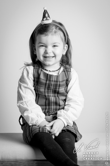 Séance photo d'une petite fille pour Noël