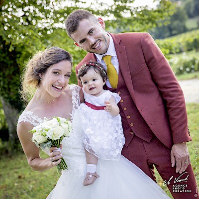 Reportage mariage - Belle photo des mariés et de leur fille